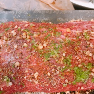 flat iron steak marinating